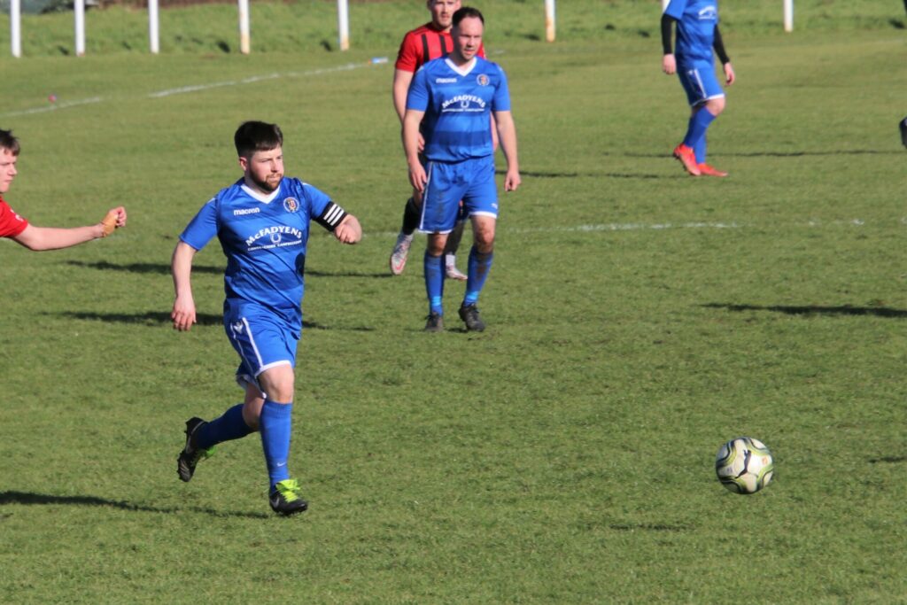 Pupils captain Keith Mitchell chasing down the ball during Saturday's match. 
