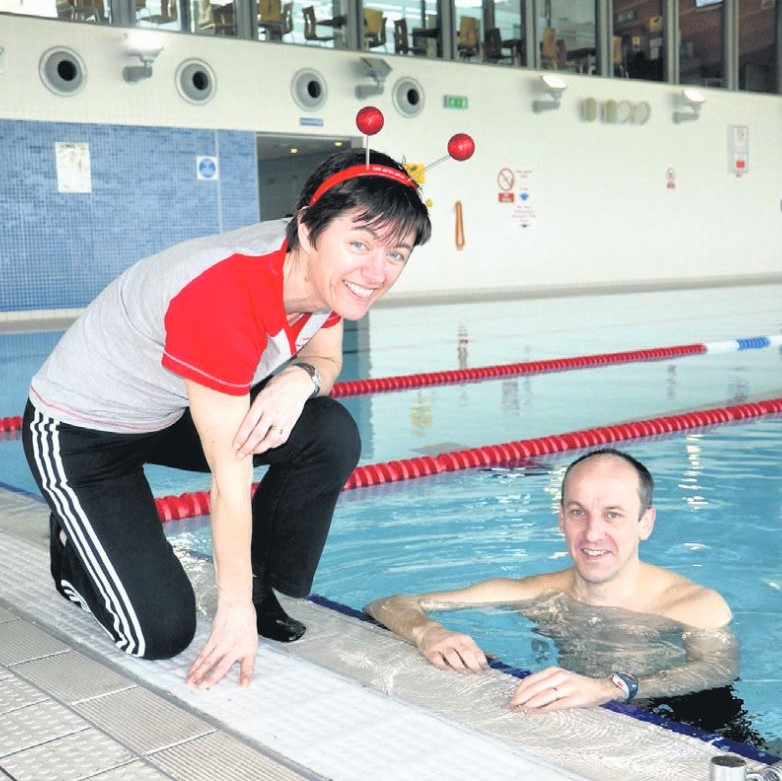 In 2012: Campbeltown was buzzing at the weekend with hundreds of people of all ages completing the Sport Relief mile, and raising money for charity. Pictured is event organiser Fiona Irwin from Jog Scotland with Stuart McQuaker, who had swum the mile in the pool at Aqualibrium.