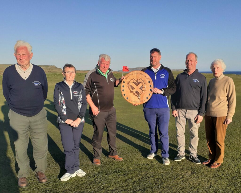 From left: Third placed Sandy Watson and Mary Wilson, winners John Brown and Raymond Harvey, club captain Donald Brown (Southend) and honoured guest Belle Robertson MBE.