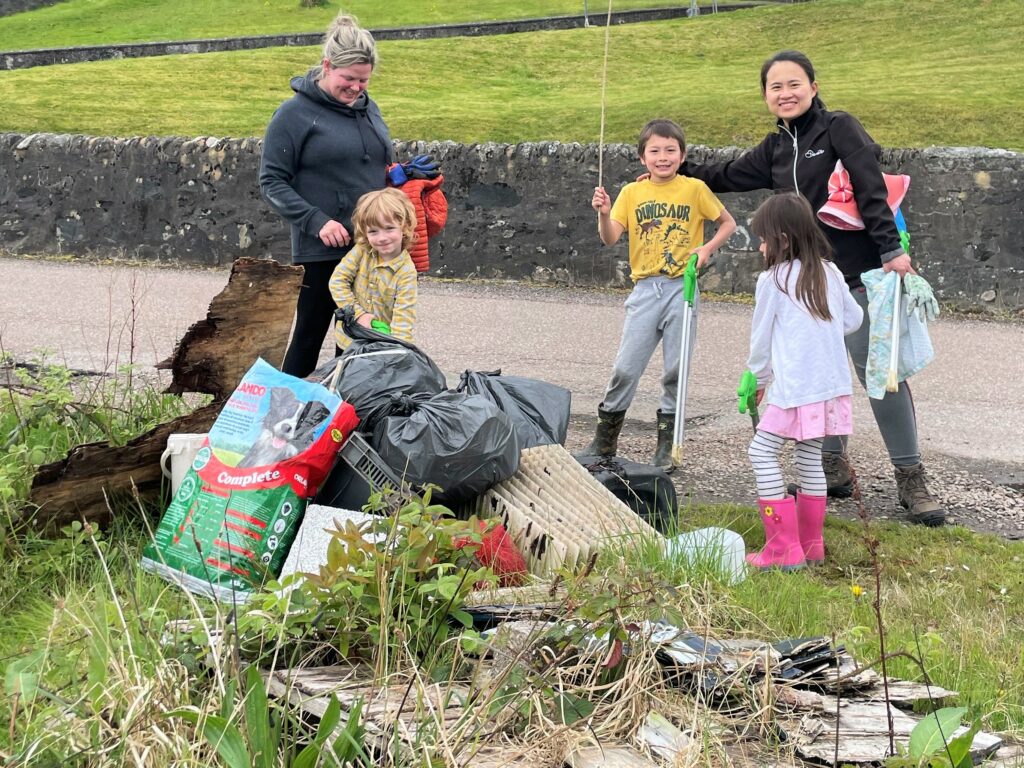 Some of the adults and children who got involved with the 'Big White Shore Beach Clean'.