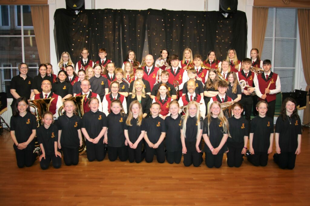 Members of the CBBz beginners' programme, front row, joined Campbeltown Brass's junior and senior bands, behind, at the concert.