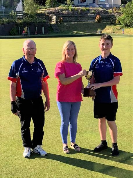 Winners Callum Wilkieson and Ian Clark were congratulated by Emily Baird from West Loch Shores which sponsored the open pairs competition.