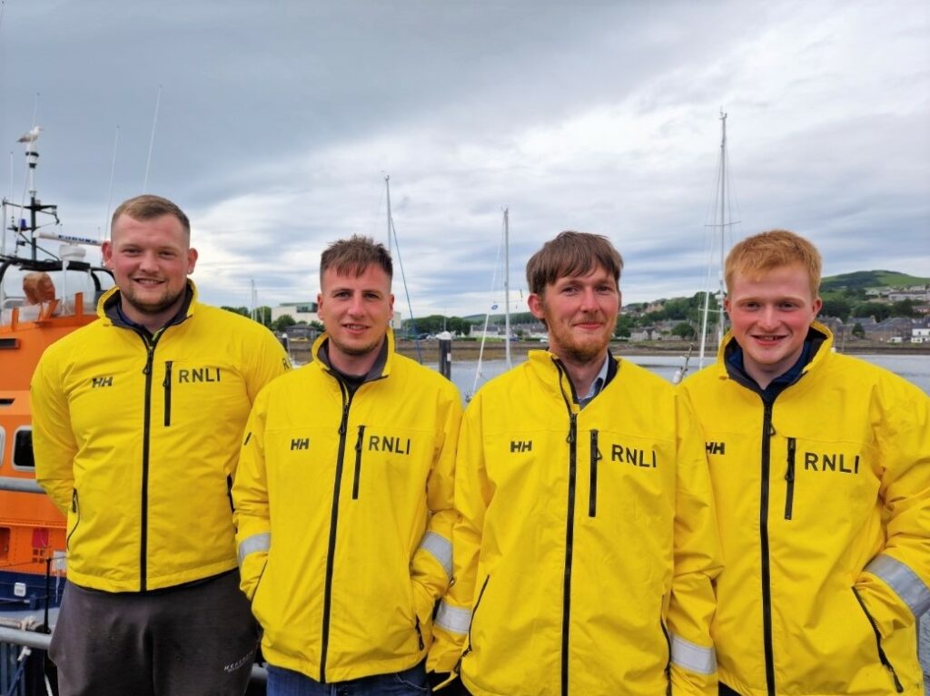 From left: Ben Miller, Mathew Conley, Keith Dickson and Ross Conner, the Campbeltown Lifeboat Station volunteers who helped the couple. Photograph: RNLI/Carla Jackson.