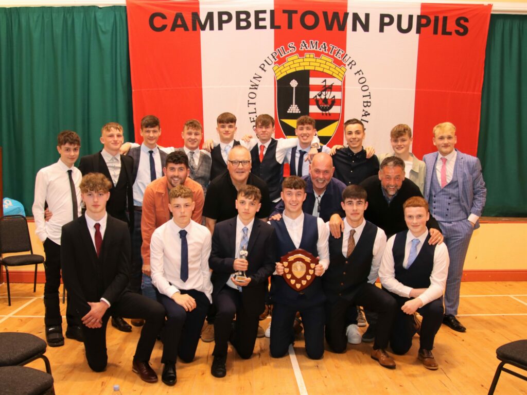 Campbeltown Pupils YFC 2005s (under-17s) photographed with their coaches and manager.