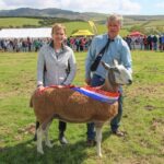 Breeder John Mclachlan and his wife Jean with the 2022 Kintyre Agricultural Show champion of champions, a Bluefaced Leicester sheep from J & M Turner of Kildalloig.