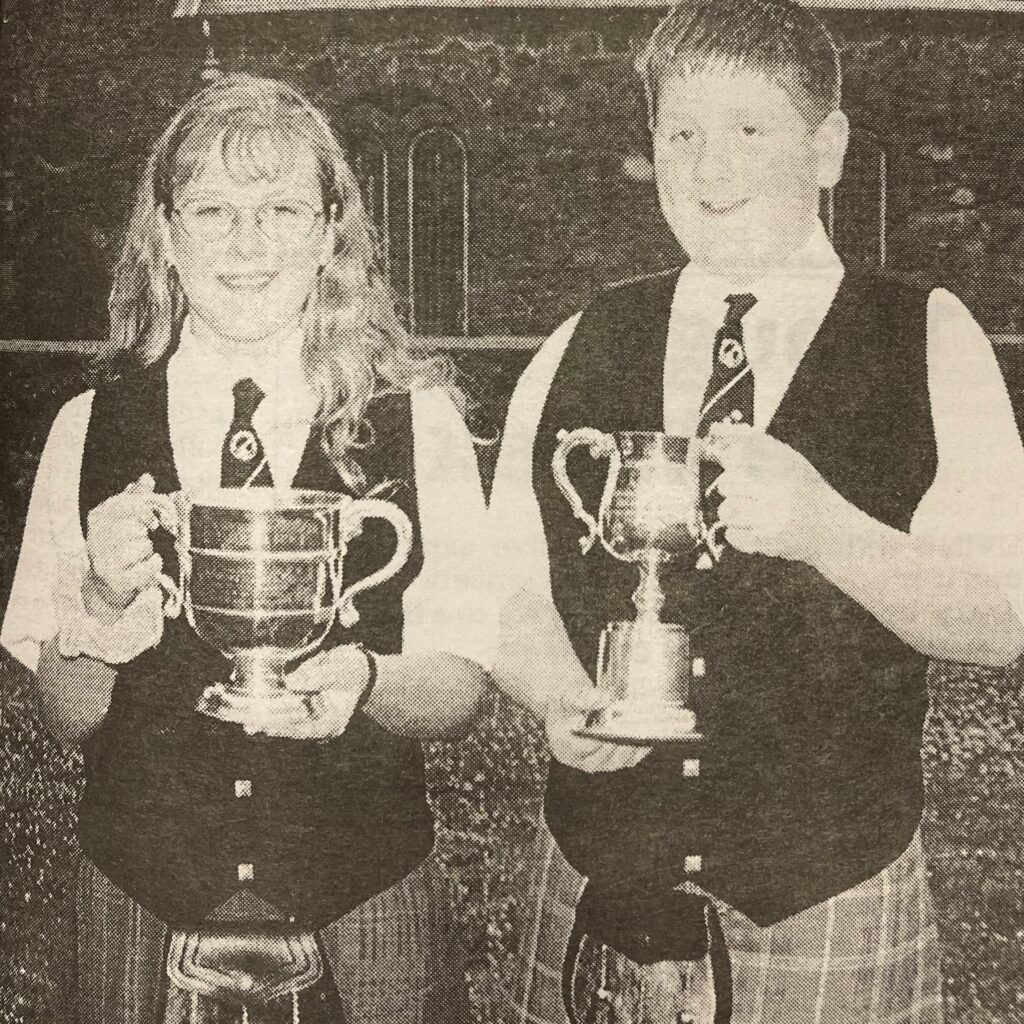 1997: Pipers Laura McCallum and Lorne MacDougall with their trophies.