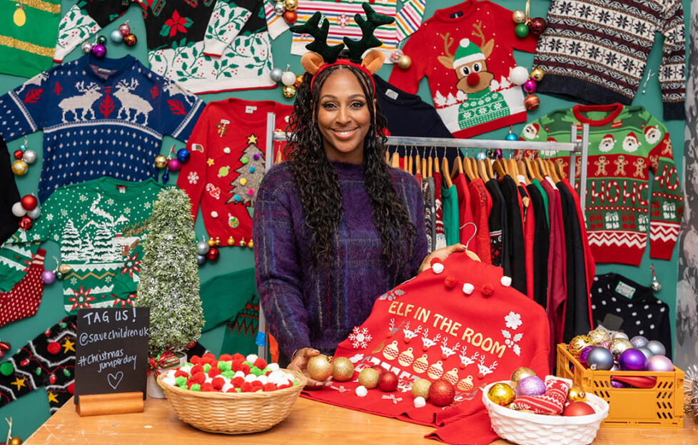 © Jeff Moore: Alexandra Burke is pictured in a personalised ‘Elf in the Room’ jumper, in a humorous nod to her iconic ‘elephant in the room’ meme, to launch Save the Children’s ‘Jazz Your Jumper’ pop up store at Westfield London