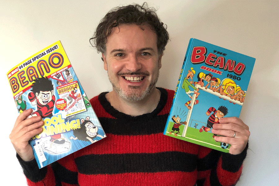 Mike Stirling with Beano annuals