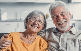 A happy and health older couple at home