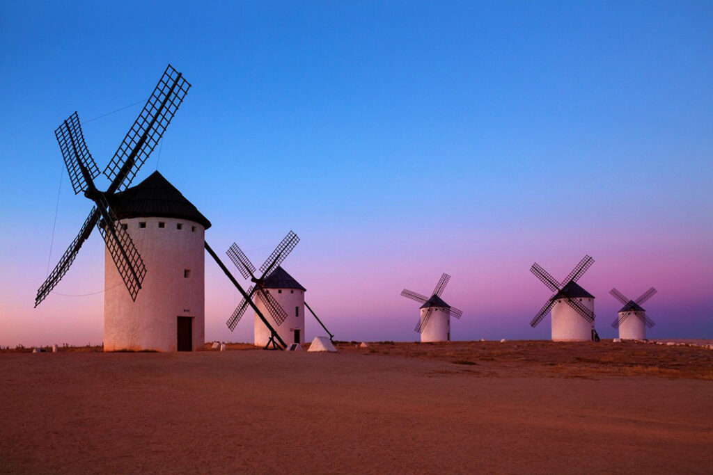 A group of windmills captured at dusk by Steve Allen in La Mancha, Spain.