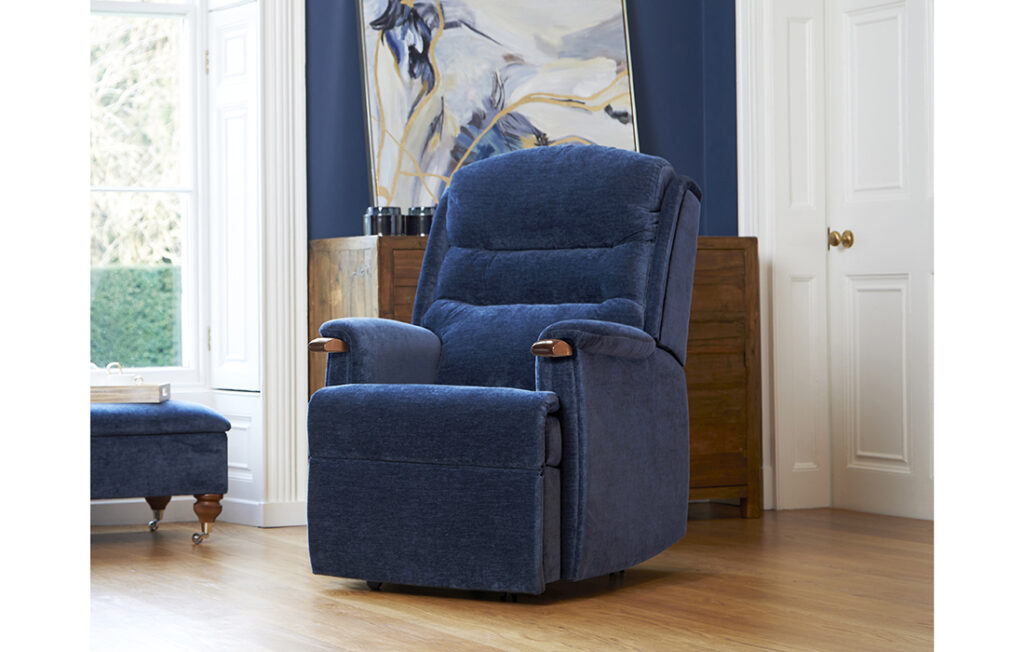 Blue reclining chair with foot rest