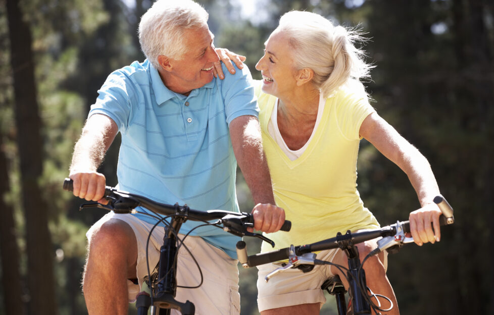 Senior couple on country bike ride;