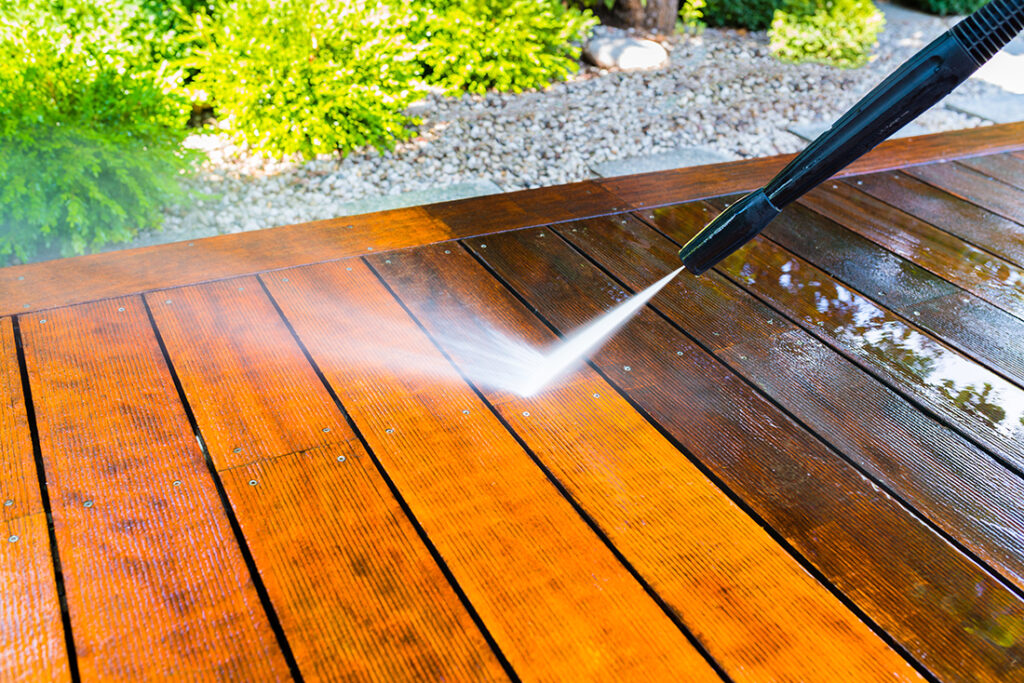 Pressure washing a terrace Pic: Shutterstock