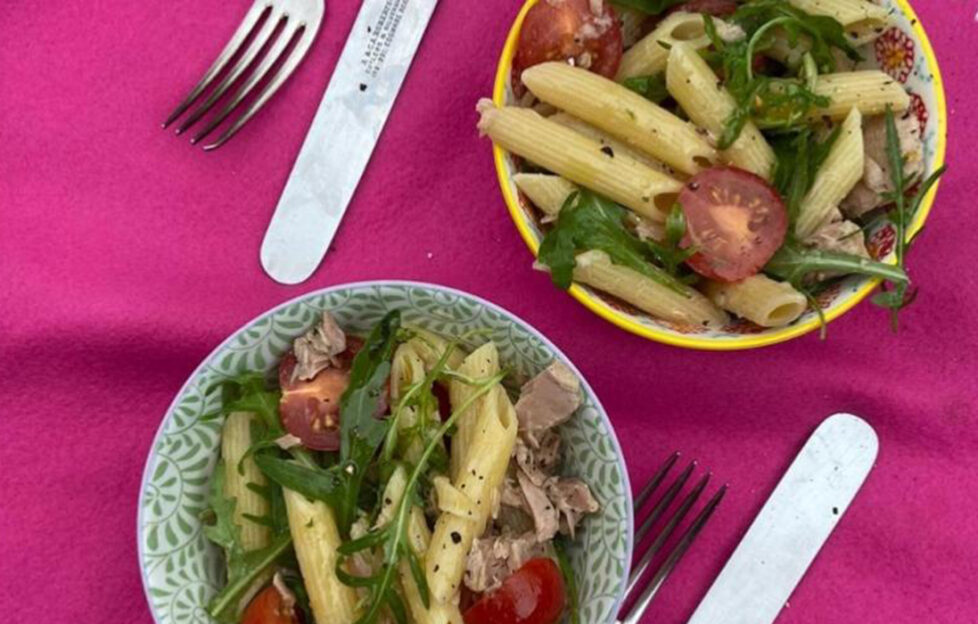 2 bowls of pasta salad with rocket and cherry tomatoes