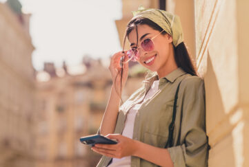 Lady on mobile overseas Pic: Shutterstock