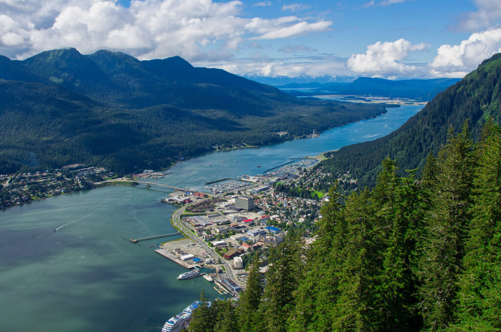 Juneau, Alaska. City surrounded by forested hills and wide river