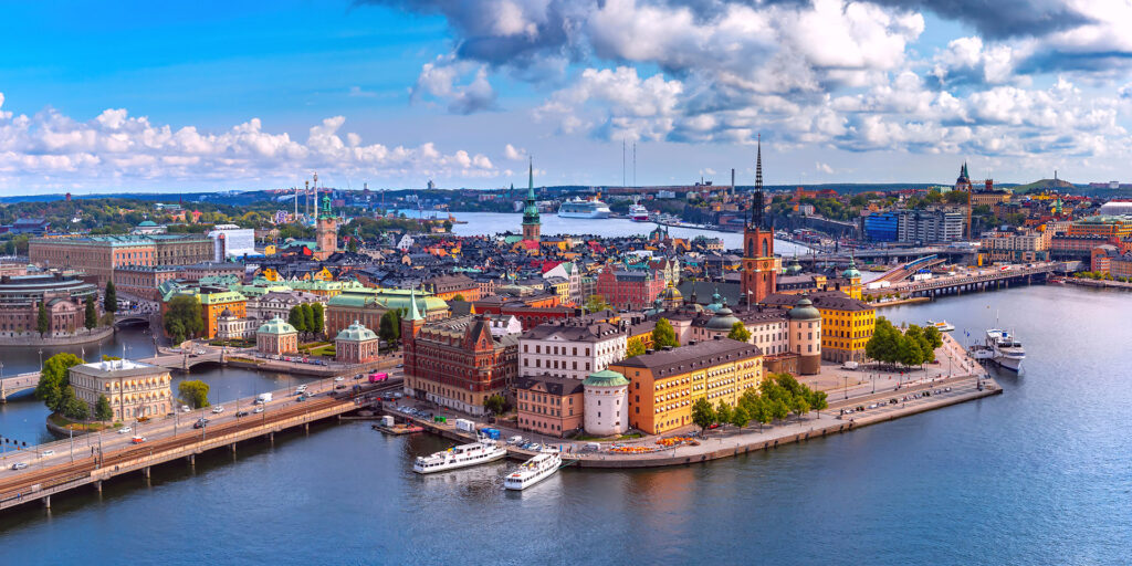 Scenic summer aerial panoramic view of Gamla Stan in the Old Town in Stockholm, capital of Sweden; 