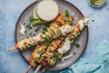 Grilled salmon skewers with cheese dip