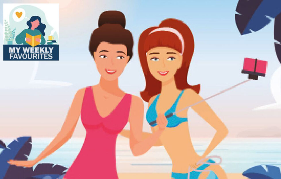 Two girls taking a selfie on holiday Pic: Shutterstock