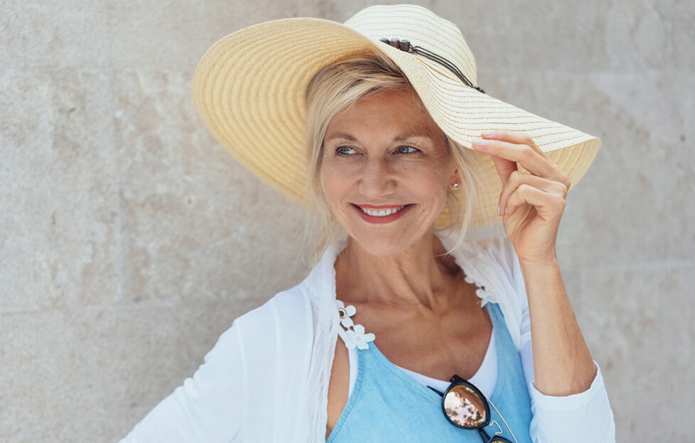 Lady wearing a wide-brimmed hat Pic: Shutterstock