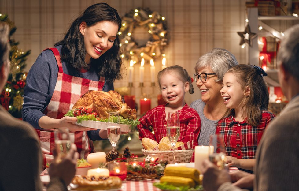 A happy family having Chrismtmas dinner Pic: Shutterstock