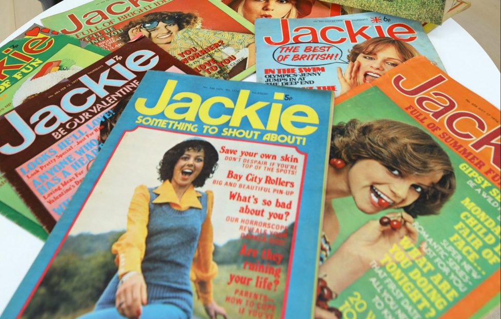 A pile of archived Jackie magazine issues featuring an array of popular cover stars of the time.