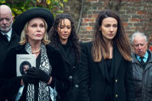 New Tv Shows January 2024. Image: a still from the new Netflix thriller Fool Me Once, shows actors Joanna Lumley and Michelle Keegan in a funeral setting.