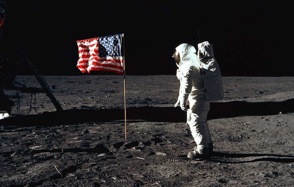 Astronaut planting the American flag in the moon Pic: Shutterstock