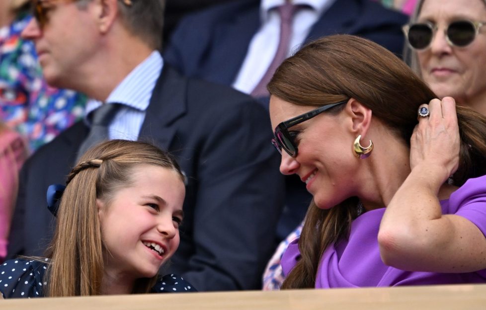 Kate returned to Wimbledon with daughter Charlotte. They are pictured here smiling at one another as they enjoy the match.