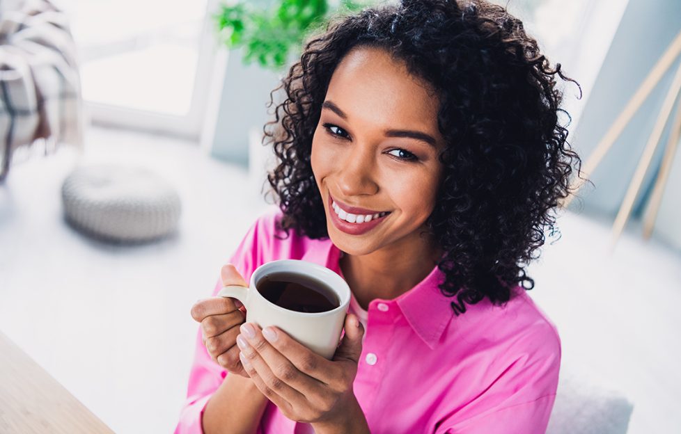 Lady enjoying perfect coffee