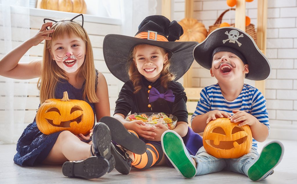 Three children dressed for Halloween