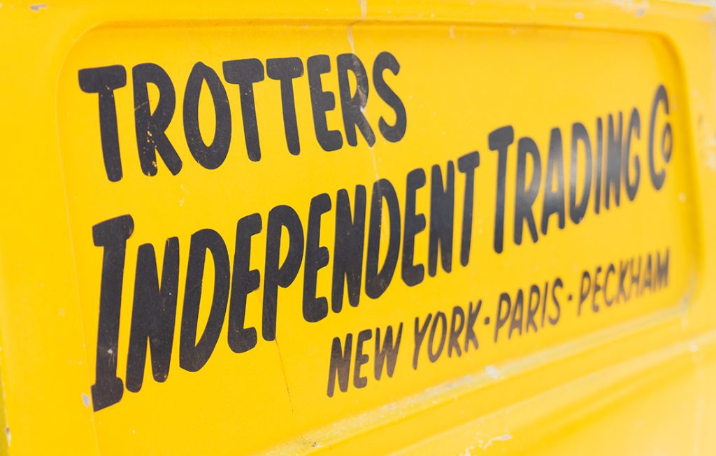 Yellow van with Trotters Independent Trading on the side