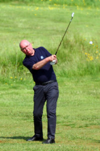 Oban Times deputy editor Martin Laing approaches the fourth green