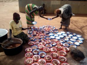 Volunteers prepare Mary's Meals in South Sudan.