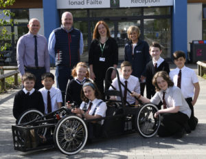 Lochaber High School young engineers club members with staff and representatives of Liberty British Aluminium with the electric racing car. Picture: Iain Ferguson, The Write Image. NO F20 electric car extra