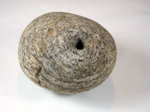 The large round stone with a hole which is believed to have supported the Jacobite standard at Glenfinnan in August 1745. It is currently on loan to the West Highland Museum. Photograph: West Highland Museum. NO F34 Glenfinnan Stone (low res) 