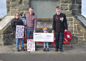 At the cheque presentation: Chelsea and John Willis, holding baby George, left, fundraising hero Emelie, centre, and Richard Cameron,  Campbeltown's area convenor for Poppyscotland, right.