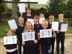 Rhunahaorine Primary School's children with their John Muir Trust Discovery Award and participation certificates.