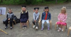 The nursery children, accompanied by Mandy Beveridge on guitar, ended the ceremony with a goodbye song.