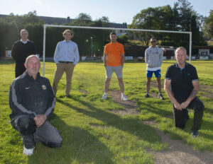 Some of the team which is working to restore Claggan Park, at the ground on Monday night - front from left are Mark Rydings and David MacDonald. Back row from left are Peter Murphy, Olly Stephen, Mark Gillespie and Iain MacKay. Photograph: Iain Ferguson, alba.photos NO F32 Save Claggan Park 02