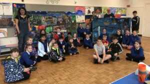 Artist Sarah Longley with the children at Kyle Primary School. Photograph: Sarah Longley. NO F45 Atlas 02