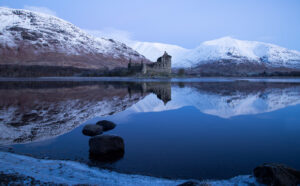 Kilchurn Castle by Edwina Aitken. 'This was taken early one very cold morning in January. (Temperature was around -3). It was a still morning and the light was nice as the sun started to rise. This image gives the feeling of the cold and stillness of the loch.
