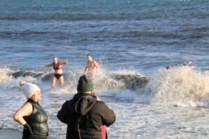 North Atlantic Ocean waves battered the Peninver swimmers.